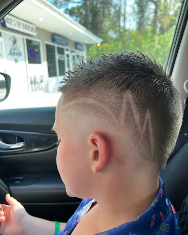 Kid's fade with a hair design detail